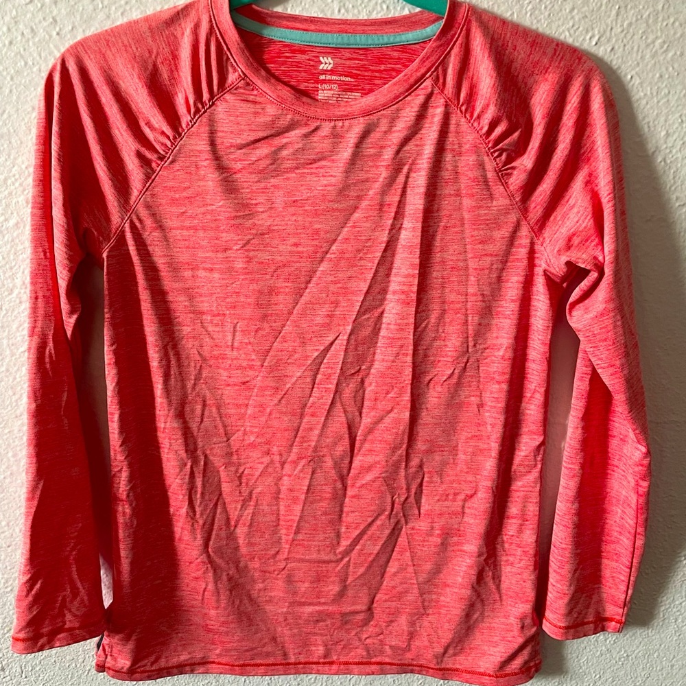 All In Motion girls top. Pretty ruched detail. Brilliant color. NWOT.